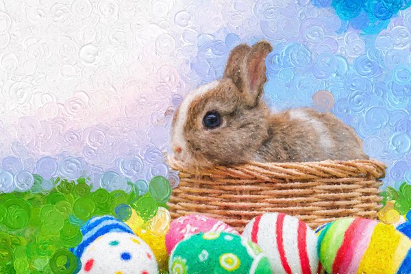 Bunny Bokeh: a rabbit in a basket surrounded by colorful eggs and rounded paint strokes
